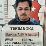 Hendra Als Een (28), pelaku penganiayaan saat diamankan Polsek Bayung Lencir