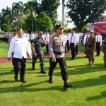 Apel pasukan dalam rangka Operasi Lilin Musi tahun 2022 di halaman Kantor Bupati OKI, Kamis (22/12)
