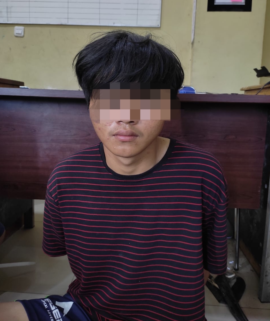 Wiranto alias Acik (23), pelaku pencurian dengan kekerasan saat diamankan pihak kepolisian