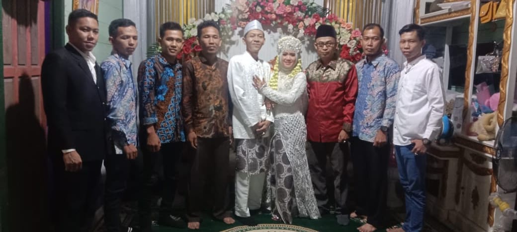 Respsi pernikahan Ketua DPD IWO Kabupaten Muba, Riansyah Putra dengan Fitriyani, Jumat (23/12/2022)