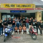 Polisi saat mengamankan para perampokan di Alfamart 02 Gelumbang Lingkungan I, Kecamatan Gelumbang, Kabupaten Muara Enim