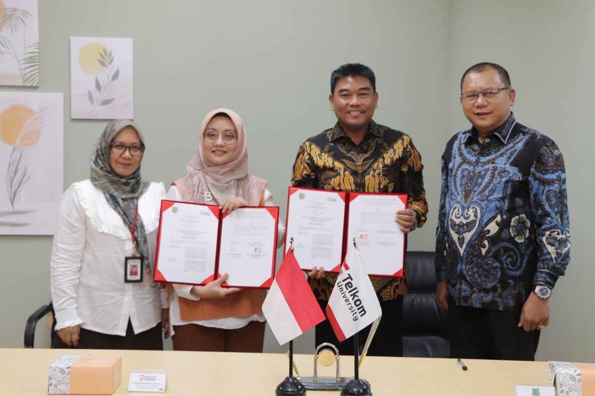Penandatanganan Kerjasama antara Pemkab Muba dengan Universitas Telkom Bandung, tentang Kerjasama Peningkatan Sumber Daya Manusia Bidang Teknologi Informasi dalam Pengembangan Sistem Pemerintahan Berbasis Elektronik