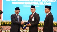 Deputi Gubernur Bank Indonesia, Juda Agung, secara resmi mengukuhkan Bambang Pramono sebagai Kepala Perwakilan Bank Indonesia Provinsi Sumsel (Dok. Bank Indonesia Sumsel)