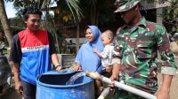 Pertamina melalui program Pertamina Peduli menyalurkan bantuan air bersih ke wilayah Kebun Tanah Kerban, Karang Baru, Aceh tamiang, Aceh, Kamis, (1/1/2026) (Dok. Pertamina / Indodaily.co) Pertamina melalui program Pertamina Peduli menyalurkan bantuan air bersih ke wilayah Kebun Tanah Kerban, Karang Baru, Aceh tamiang, Aceh, Kamis, (1/1/2026) (Dok. Pertamina / Indodaily.co)